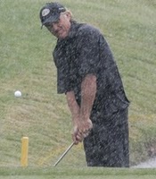 Greg Norman in rain Greg Norman in rain