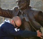 Denial: Hugging the Joe Paterno Statue at Penn State