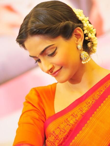 Indian engagement hairstyles with flowers Indian engagement hairstyles with flowers