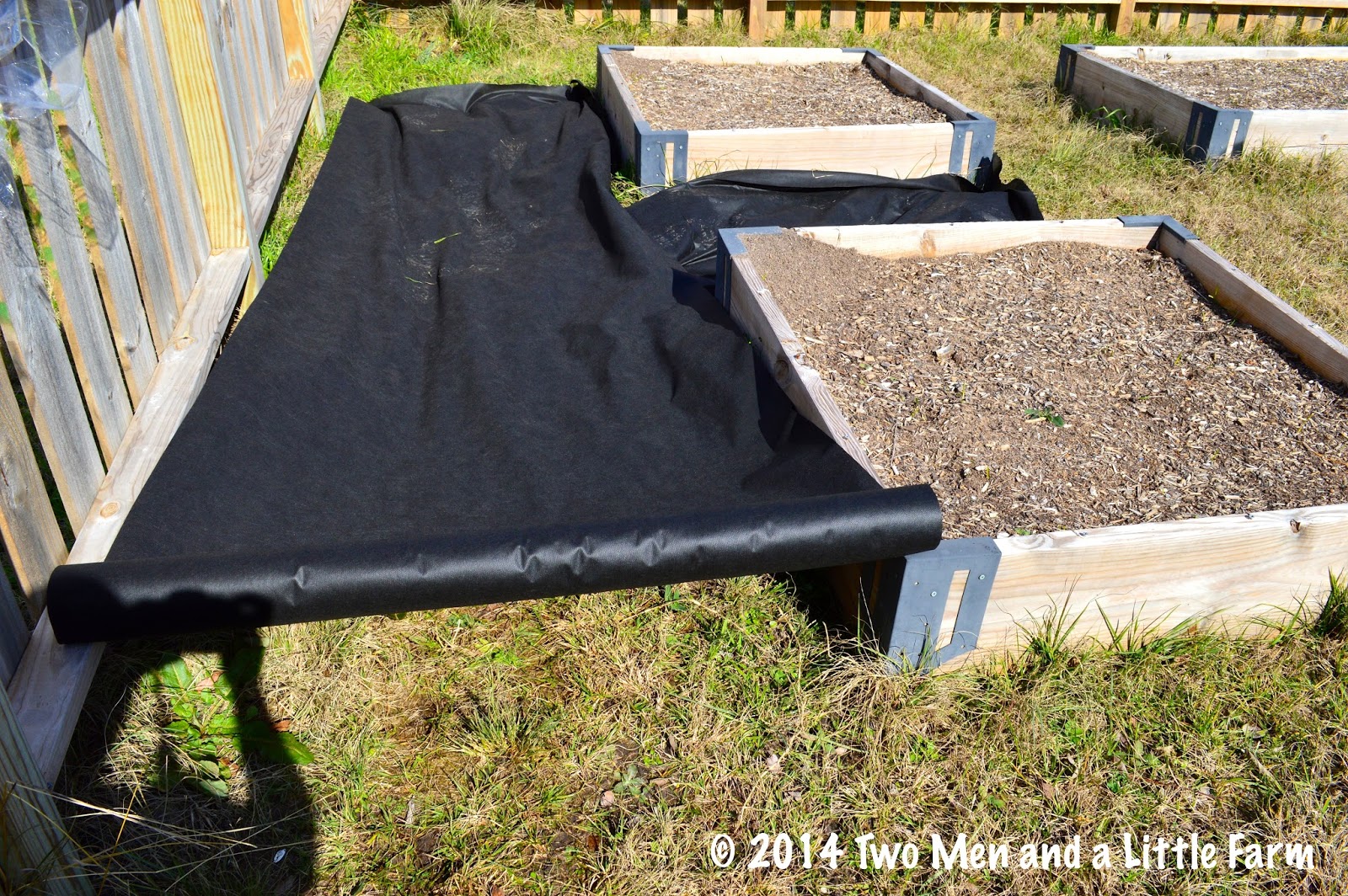 Two Men and a Little Farm WEED BLOCK BETWEEN RAISED BEDS PART ONE