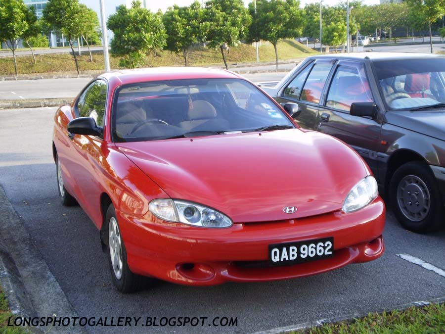 Stock Hyundai Coupe in Red Color