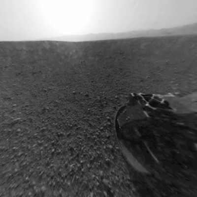 Curiosity MSL lands on Mars. Curiosity camera showing her rear-left wheel on Martian ground. 6 August 2012. NASA/JPL.