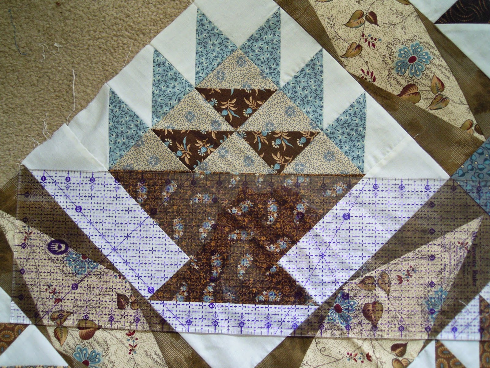 Quilting through Rosecolored Trifocals! Cutting Setting Triangles for