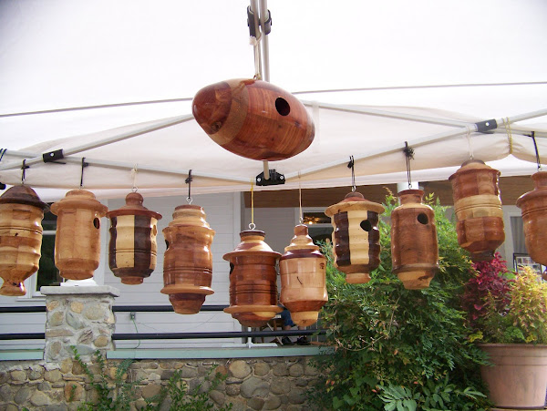 Carved wood birdhouses