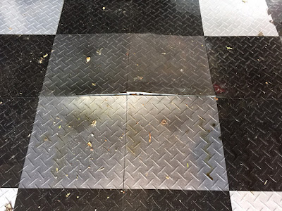 Racedeck flooring warped from the petrol weeping from my leaky fuel gasket