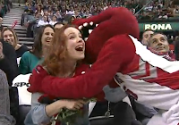 Rachel McAdams greeted by Toronto Raptor mascot