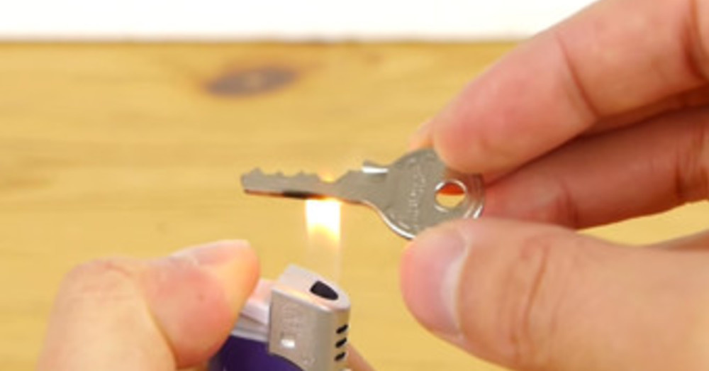 He Holds A Key Under A Flame… His Next Move Might Save Your Life One Day. He Holds A Key Under A Flame… His Next Move Might Save Your Life One Day.