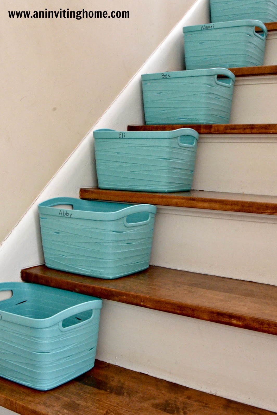 An Inviting Home Stair Containers To Collect The Clutter!