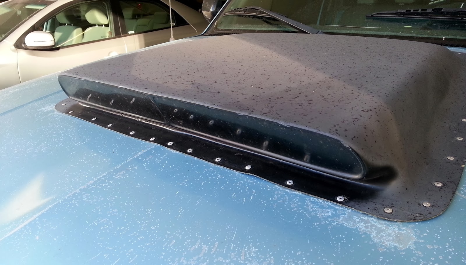 Just A Car Guy Why attach a hood scoop if you aren't going to cut out