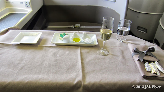 JAL First Class trip report on JL005: Table is prepped for the main meal service