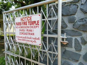 Signboard at entrance of the modern Fire Temple situated adjacent to "Globe Hotel".