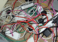 Lots of cables under a desk