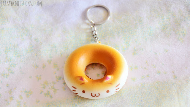 Skoshbox September 2015 DEKAbox Review: Cat Donut Keychain The September 2015 Skoshbox DEKAbox included a squishy cat donut keychain as the mystery accessory, with five different colors.
