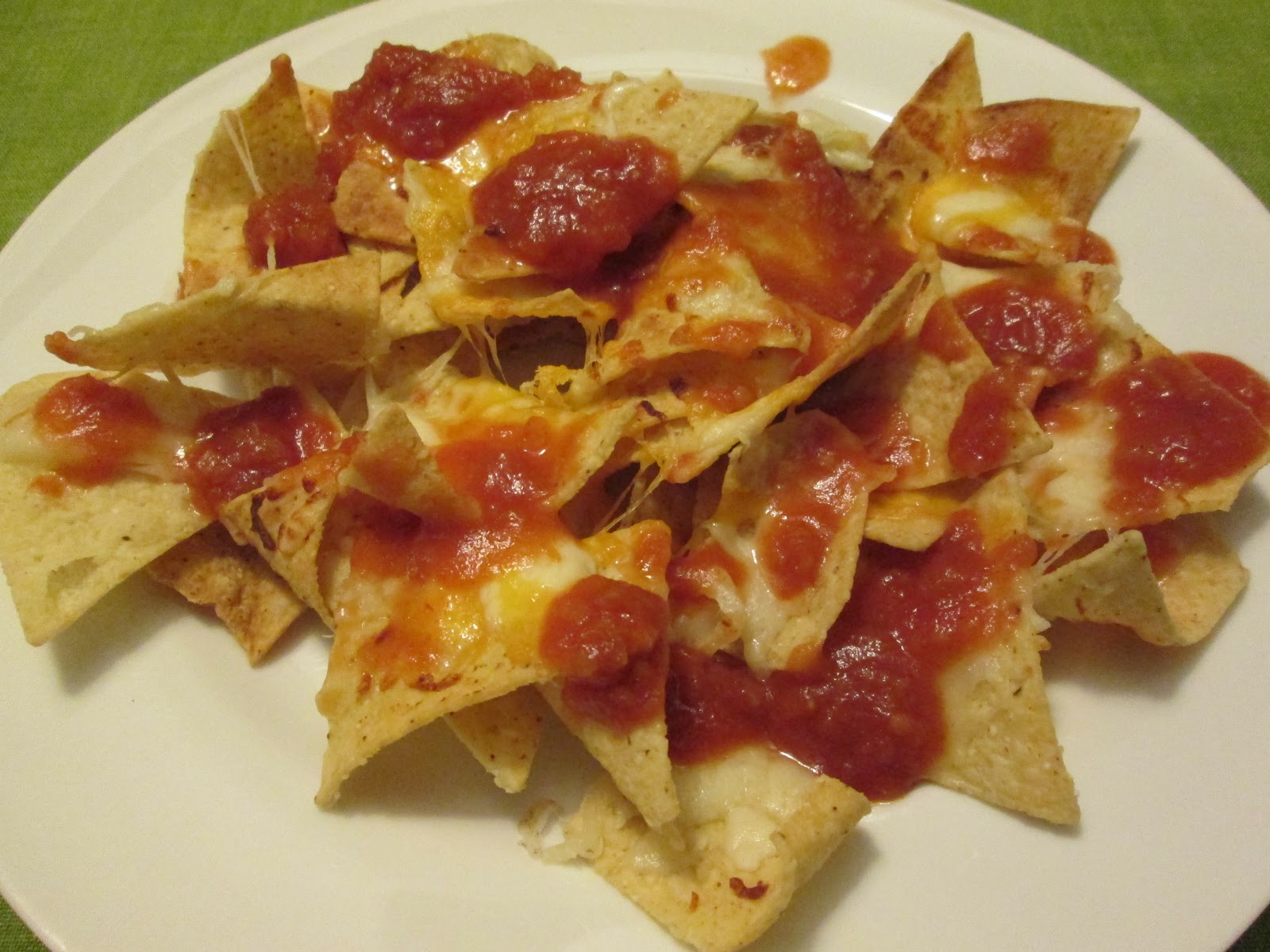 tortilla chips with meat and cheese