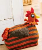 http://www.letsknit.co.uk/free-knitting-patterns/knitted_chicken_doorstop1