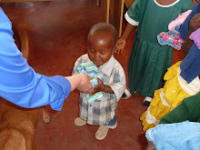 Children receiving clothes