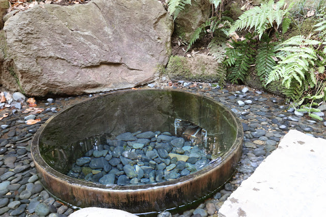 Wishing Well (kiyomasa-ido) at the garden in Meiji Shrine, Tokyo, Japan Wishing Well (kiyomasa-ido) at the garden in Meiji Shrine, Tokyo, Japan