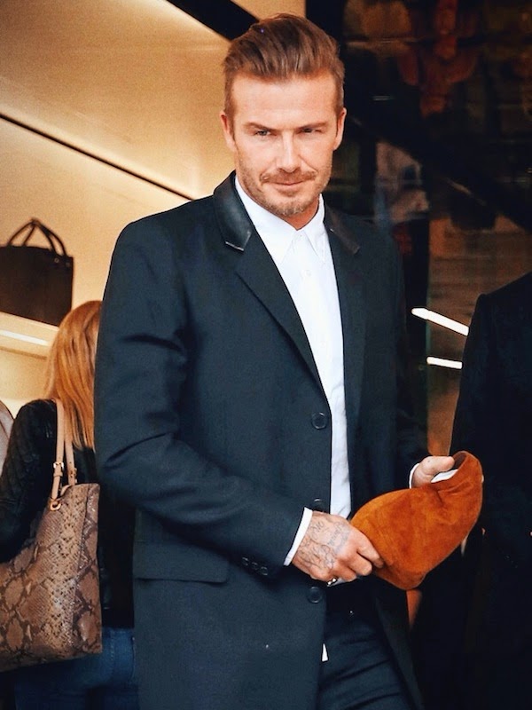 David Beckham wears Saint Laurent by Hedi Slimane leather collar coat at Victoria Beckham store opening September 2014