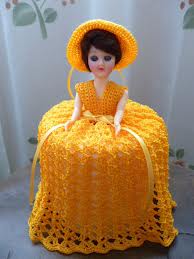 crocheted toilet paper cover with doll