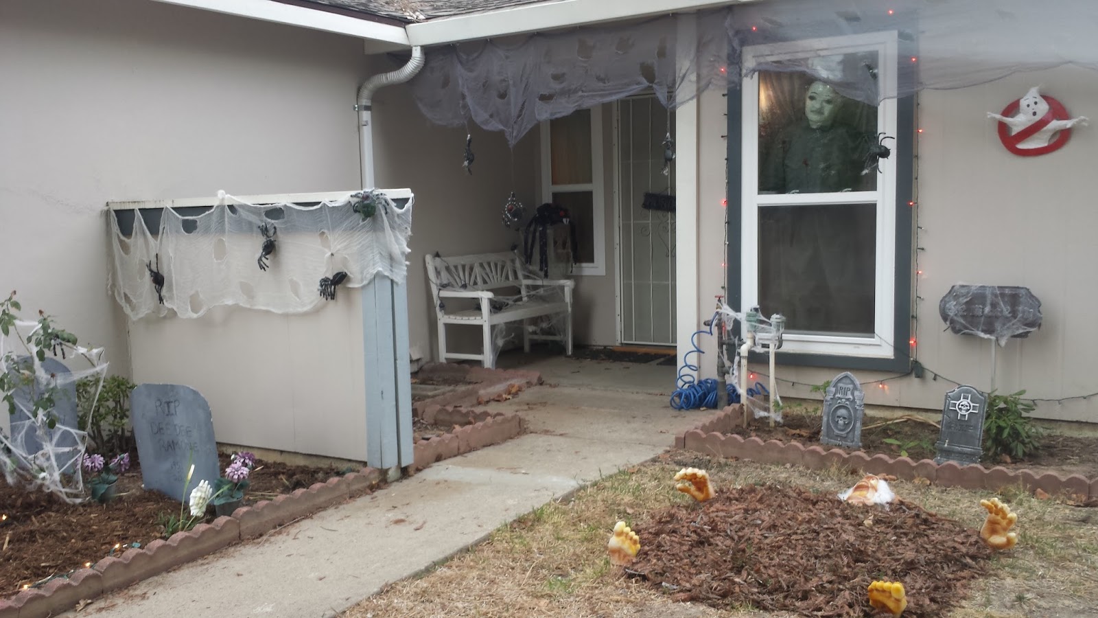 the only outdoor halloween decorations actually purchased this year included two packs of candy corn lights from home depot and a foam skull from the 99