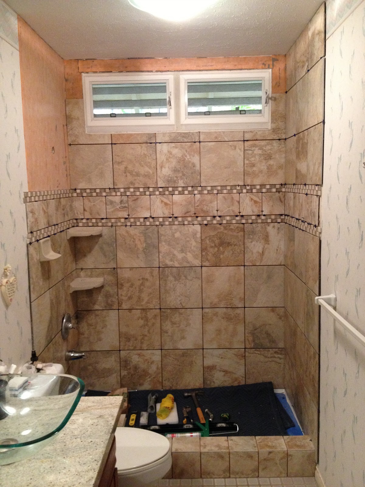 Innovative Flooring Tub converted to a walk in Shower