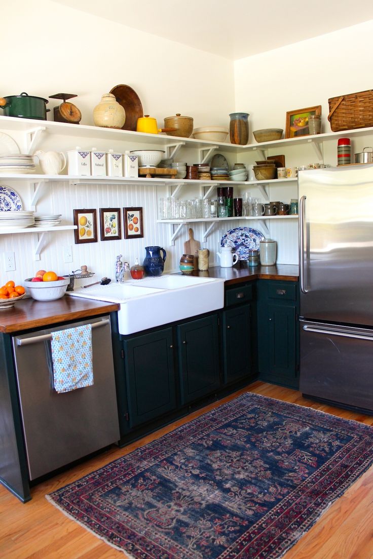 a perfect gray Put a worn oriental rug in your kitchen. Now.