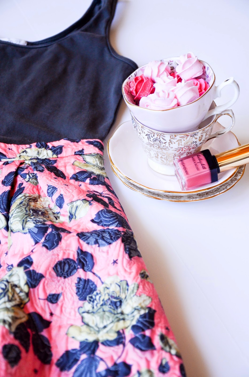 vintage pink and gold tea cups with pink sugrared roses, YSL baby doll kiss and blush, pink and gray floral midi skirt from forever21