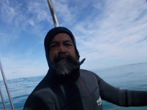 In my "REEF DIVE SUIT" awaiting my turn to enter the "Shark Cage" on the Boat.