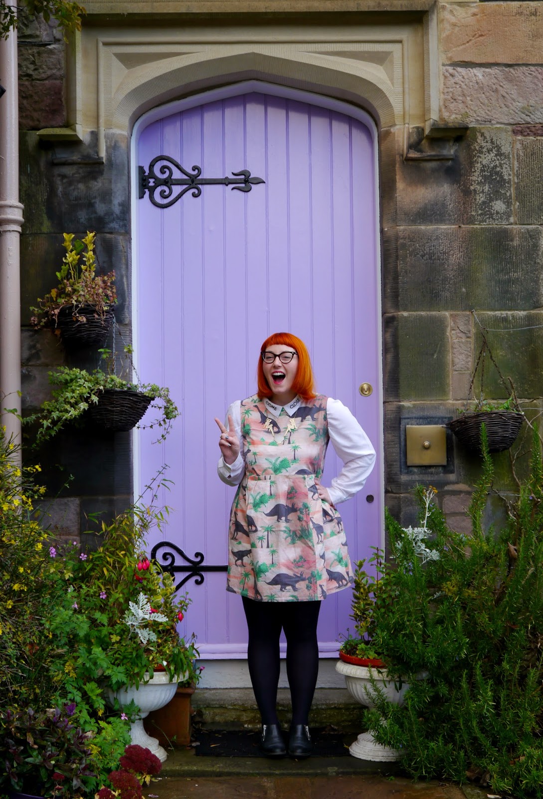 What Helen Wore Xmas Shopping Scottish Blogger, Christmas Shopping, Edinburgh Blogger, Edinburgh, Scotland Re:Designed, Limited Edition Pop Up, Dinosaur Dress, Monki Come Close Shirt, Vintage Style Me Dinosaur Dress, Karen Mabon necklace, Clarks boots, outfit, what I wore, lilac door, garden