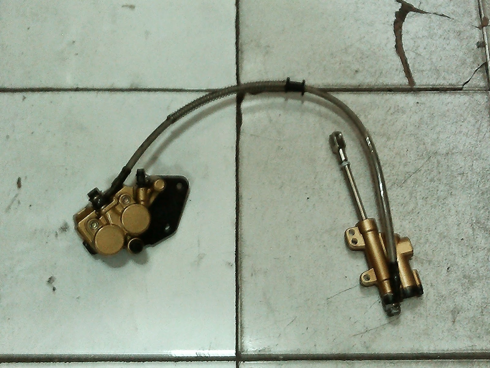 limbah motor trail jual rem disk brake belakang