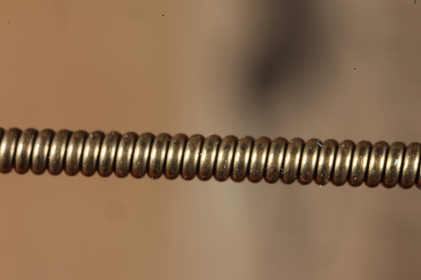 JaredDavidsonPhotography Macro photographs of guitar strings.