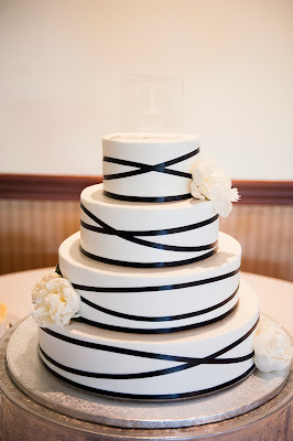 White peony and navy ribbon wrapped cake mokarafloral.com