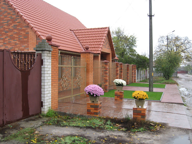 House with flower pots at the entrance