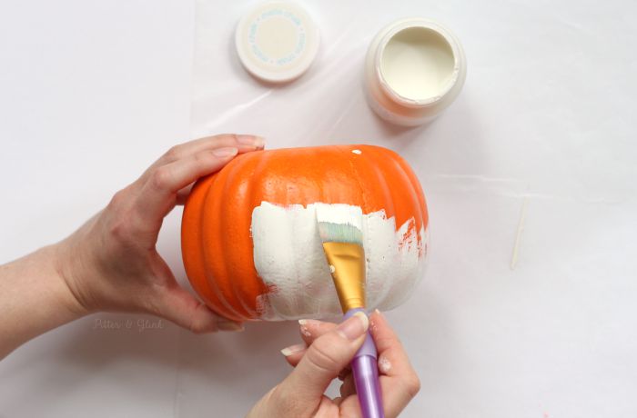 Paint a dollar store pumpkin with chalk paint to transform it. www.pitterandglink.com