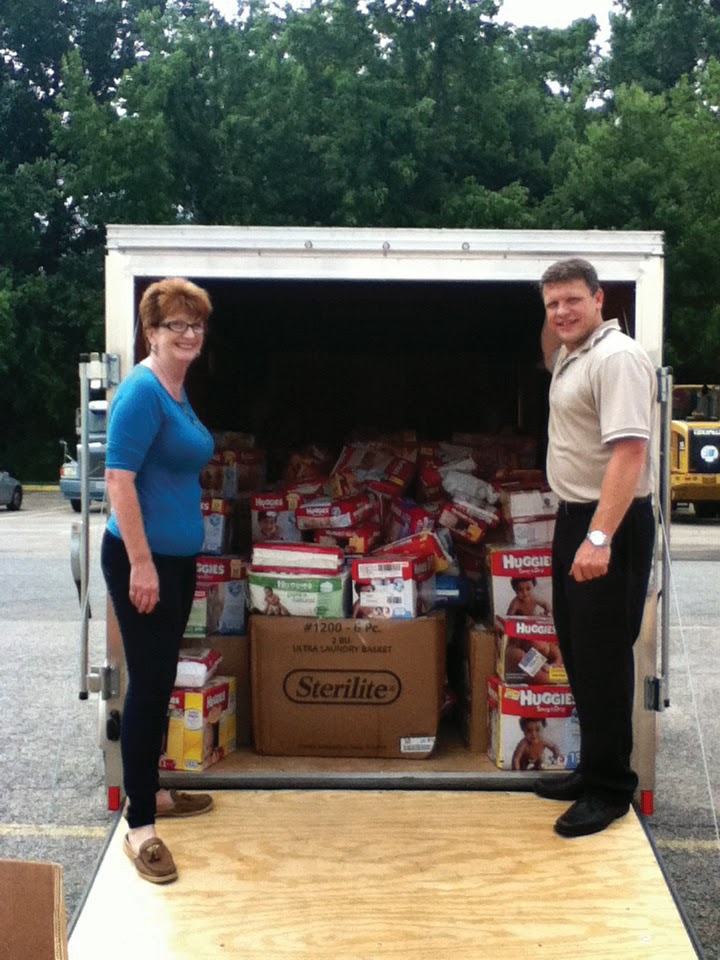 Operation Blessing International donates trailer full of diapers for CPC's clients