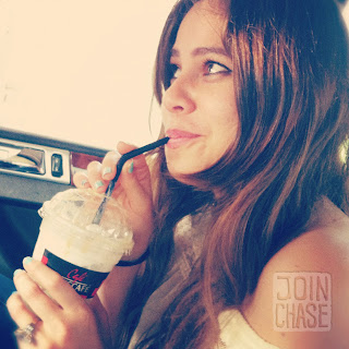 A foreign girl drinking an iced latte in South Korea. 