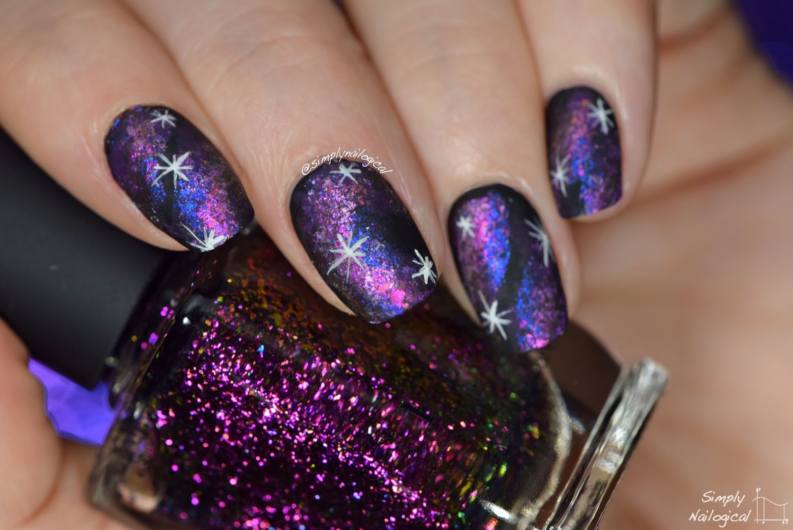Simply Nailogical Dark galaxy nails using ultrachrome flakies