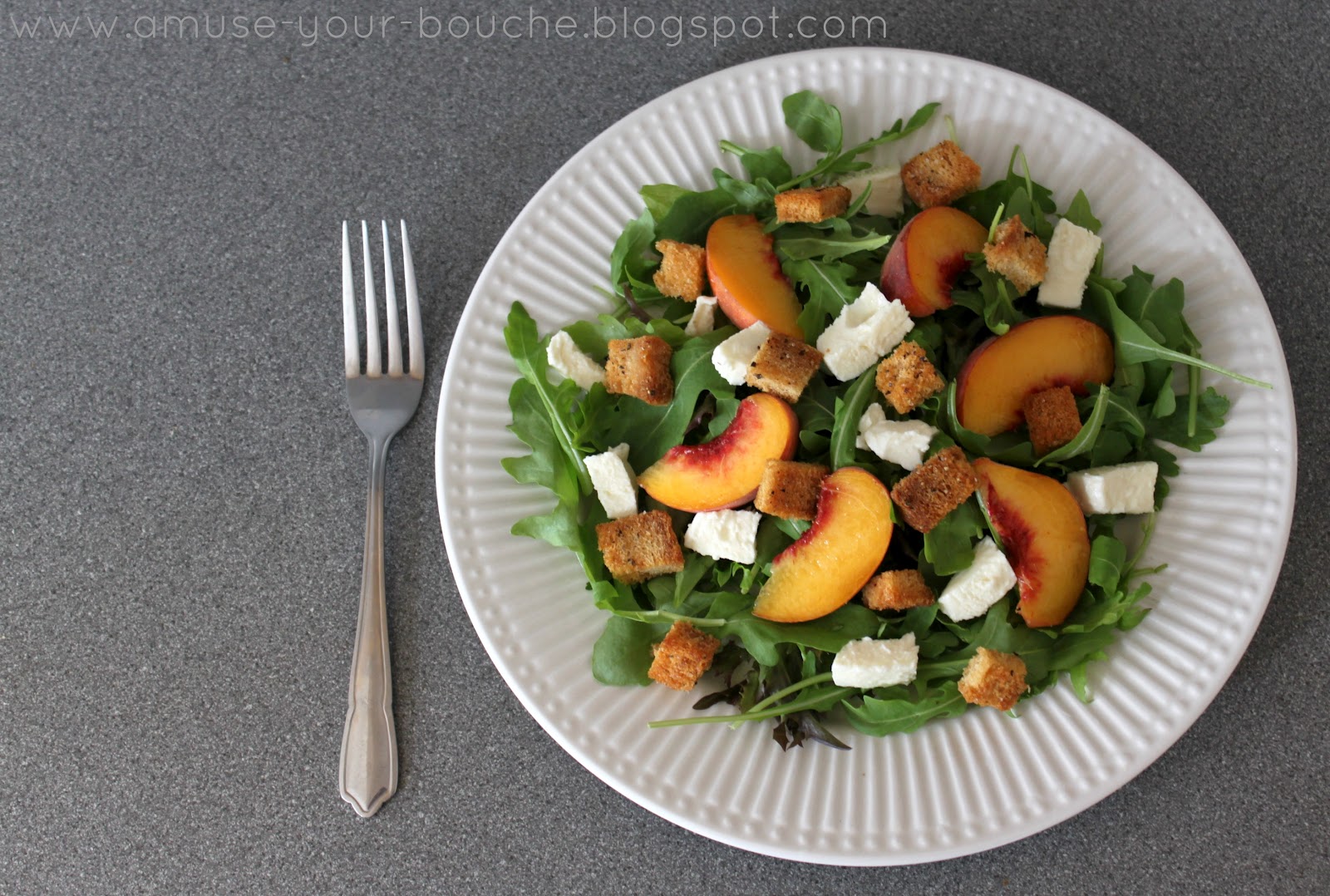 Peach and mozzarella rocket salad with balsamic and homemade croutons
