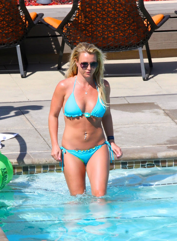 Britney Spears wearing a bright blue bikini  