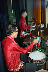 Mr David Ku on drums and Oh Kim Huat on percussion