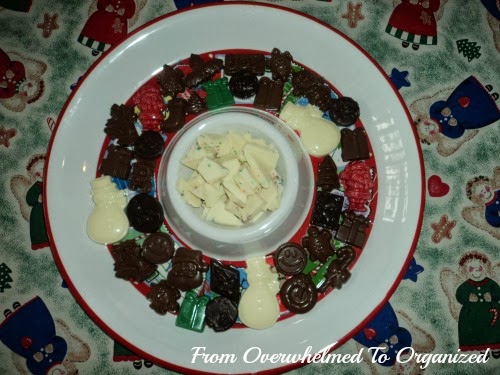 White chocolate bark and holiday treats on a plate. 