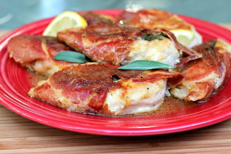 Chicken Saltimbocca: Prosciutto and Sage wrapped chicken cutlets served with a wine pan sauce!  Easy and delicious! #chicken #proscuitto
