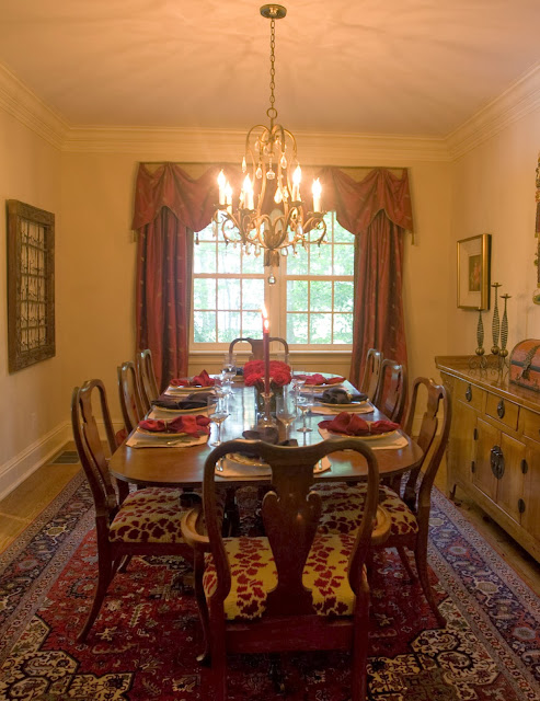 chandelier centered this elegant dining room elegant dining room design with classic chairs and large table set on a beautiful patterned carpet