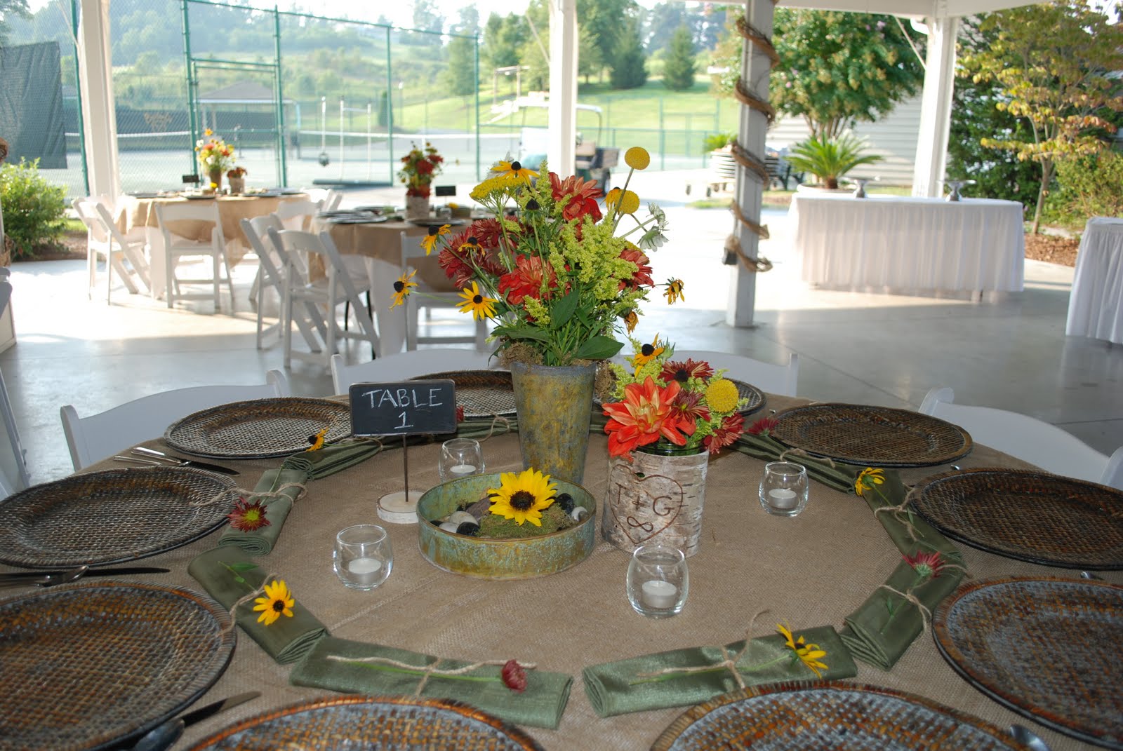 Campy Wedding Style Rehearsal Dinner Flowers and Decor