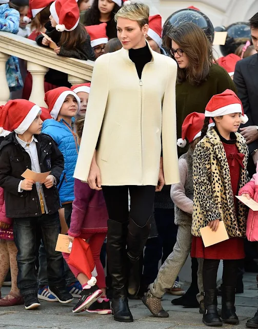 Prince Albert II of Monaco and Princess Charlene of Monaco, Camille Gottlieb and Louis Ducruet attend the Christmas gifts distribution