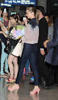 Miranda Kerr - Incheon International Airport Miranda Kerr waves and smiles at her fans