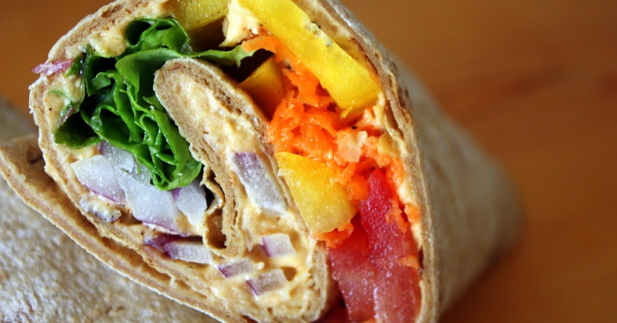 we eat. happy. smoked paprika hummus. in a rainbow veggie wrap.