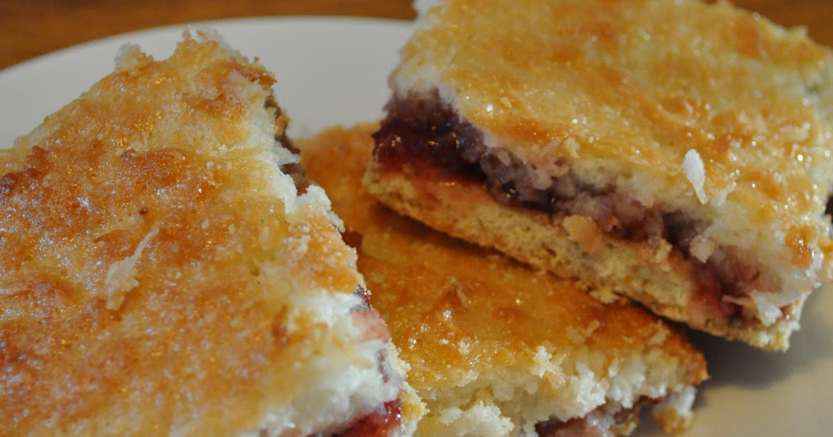 Cookies and Cakes and all things baked! Coconut Jam Sandwich Bars