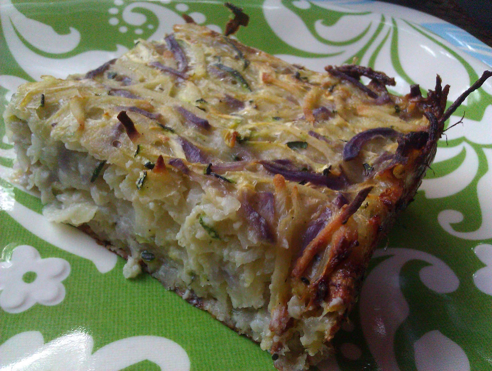 Kūlia cooks! A pile of potatoes and a giant zucchini