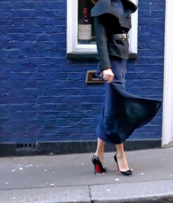 Black wool jacket over navy blue maxi dress with Christian Louboutin Pigalle stilettos